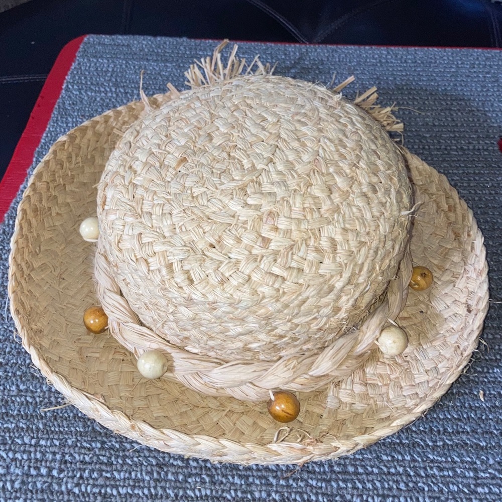 Summer straw hat with raffia trim ribbon and natural color beads